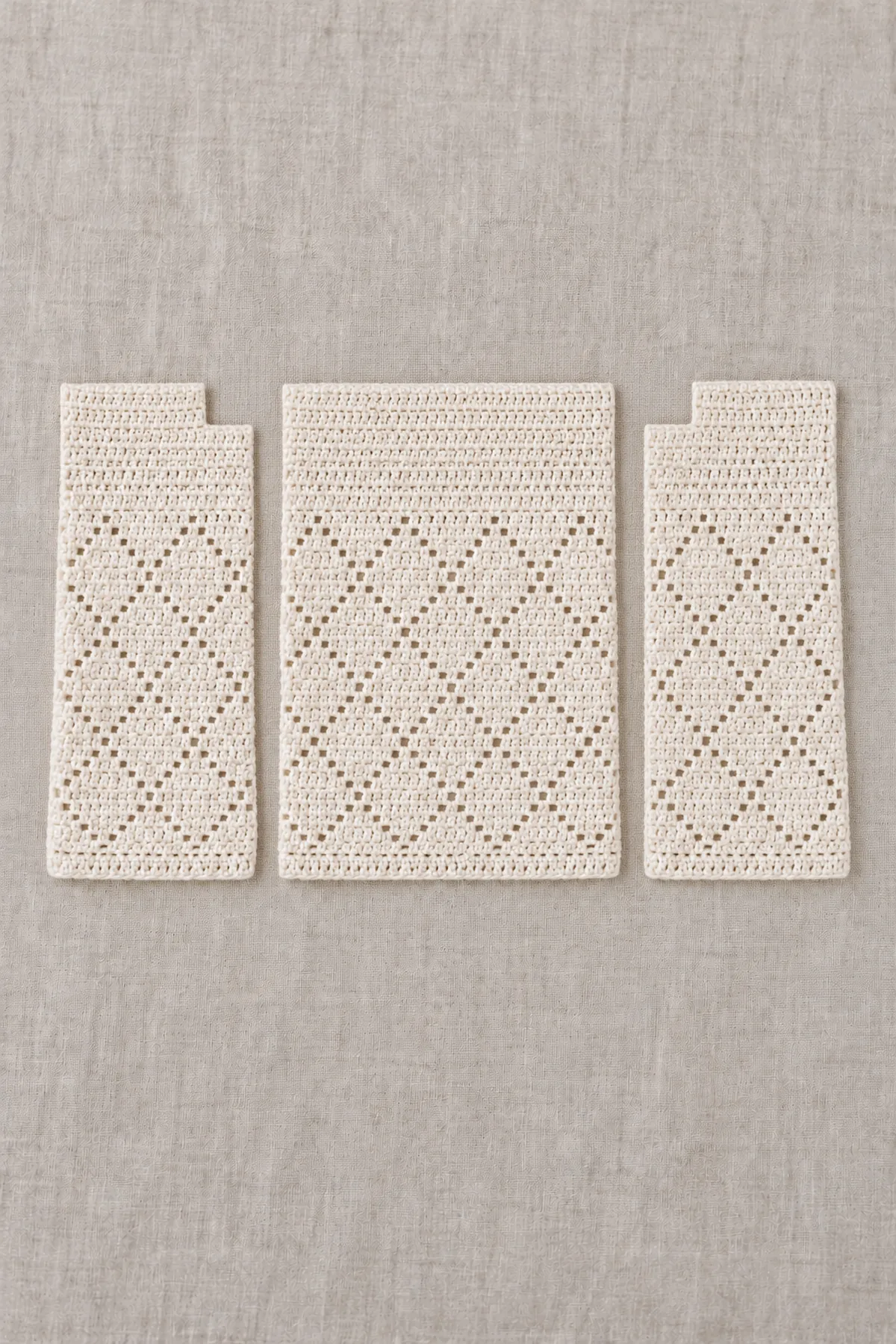 Separate ivory cropped back and mirrored front panels with tiny filet diamond windows, solid top shoulder strips and ten-position stepped neck ledges