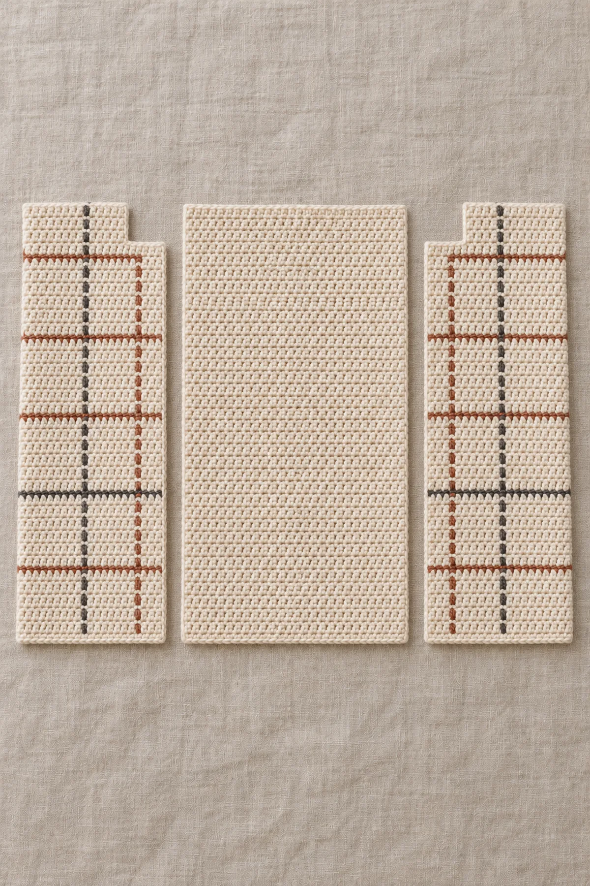 Three unjoined sc body panels: plain cream rectangular back and two mirrored notched cream fronts with fine interrupted rust charcoal plaid bars